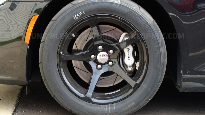 Illustration for article titled What The Hell Is This Widebody Chrysler 300 SRT With Dodge Demon Wheels?